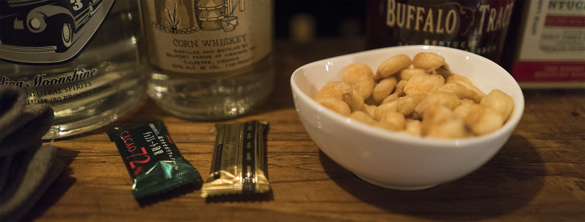 Corn nuts, chocolate and a cold oshibori to start.