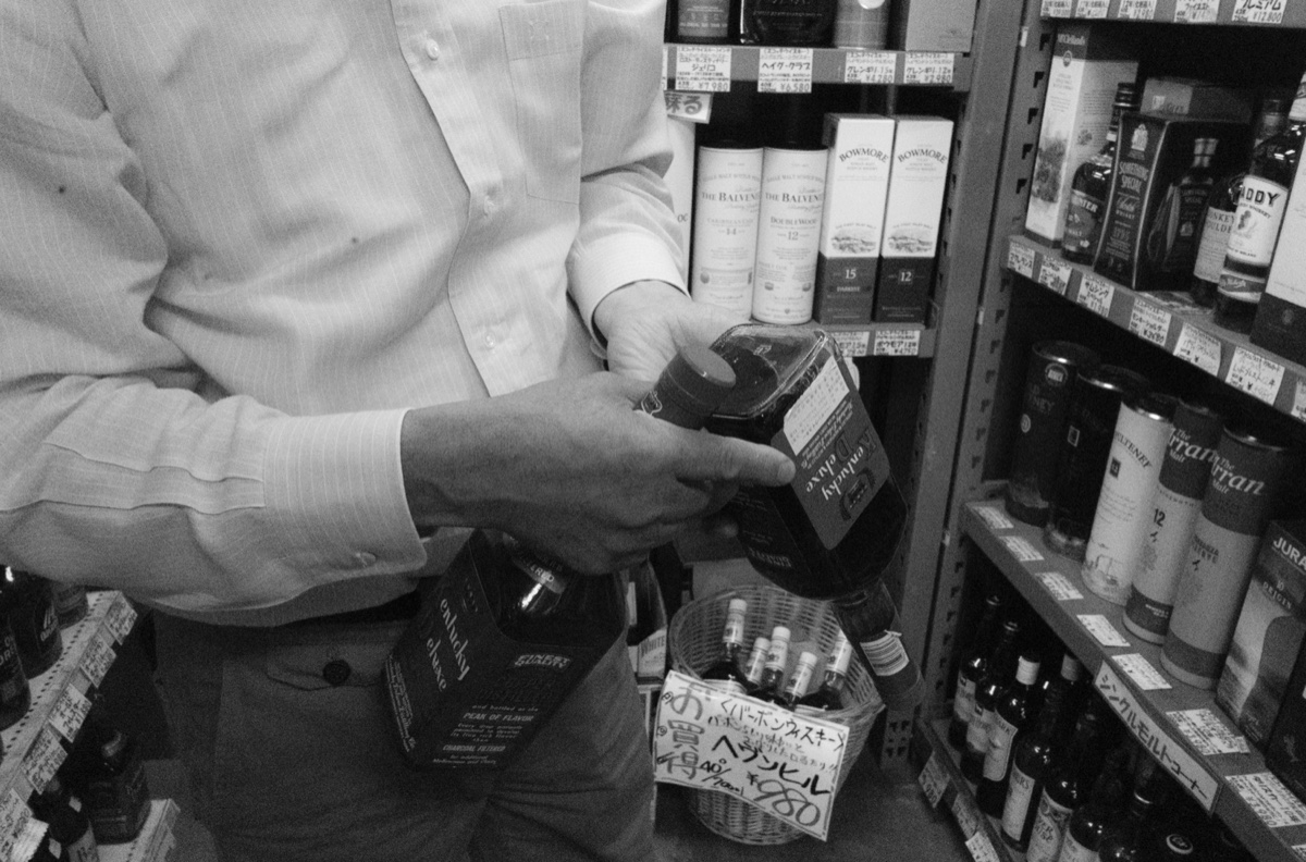 The next morning, working the shelves of a local shop