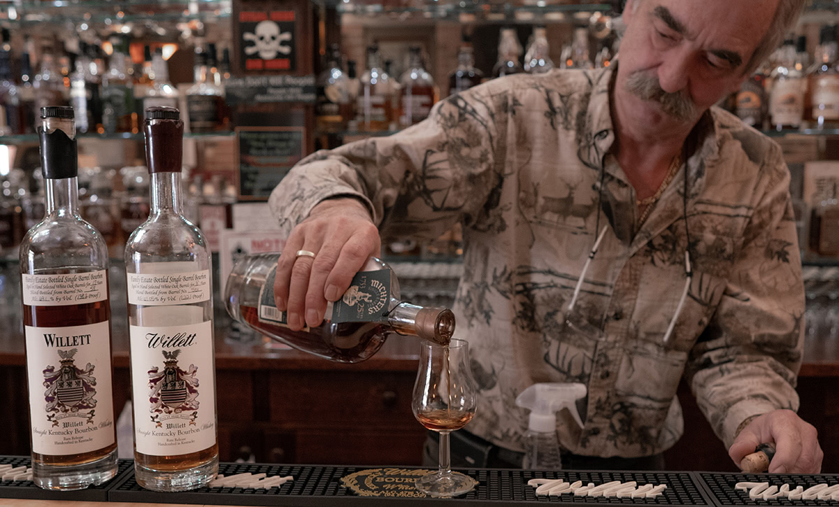 Mike pouring me a bit of whiskey